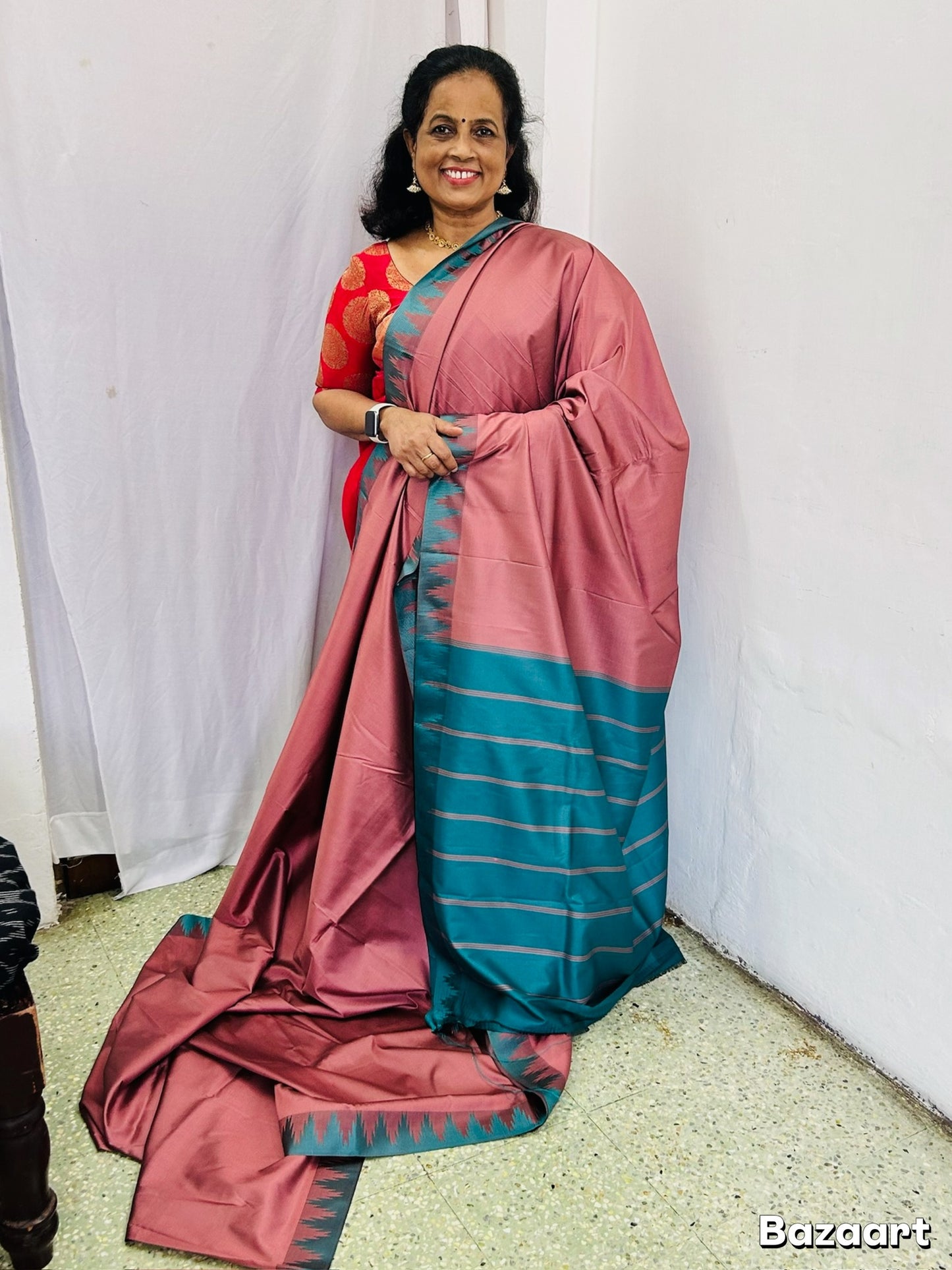 Ahana Pink semi soft silk saree with Teal border and Teal blouse