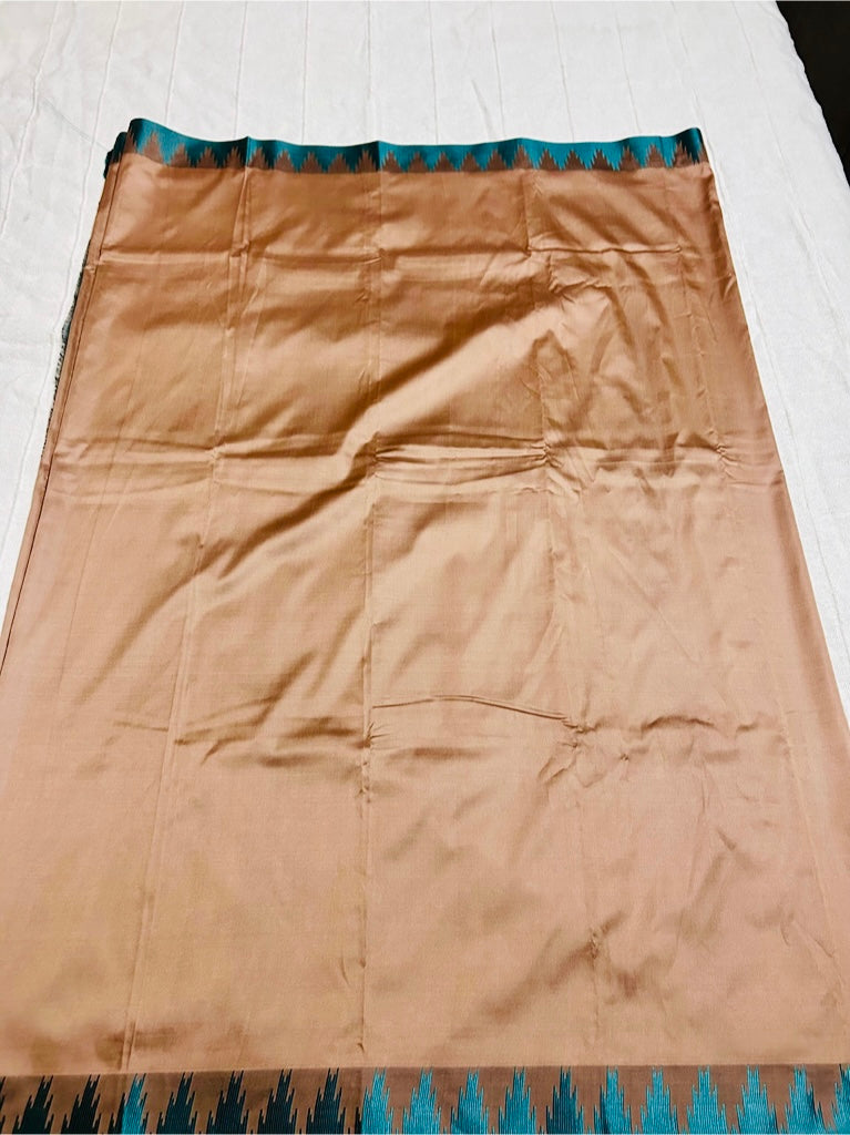 Ahana beige Semi soft silk saree with Teal border and Teal blouse