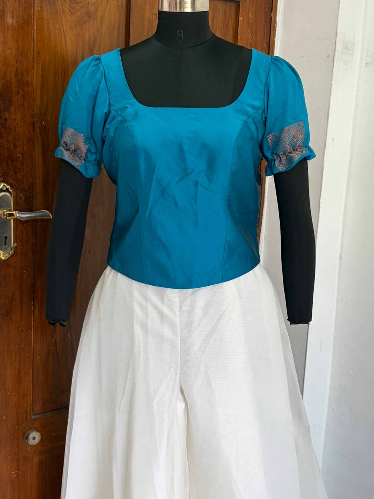 Sleeves Corsets and  Cream pant