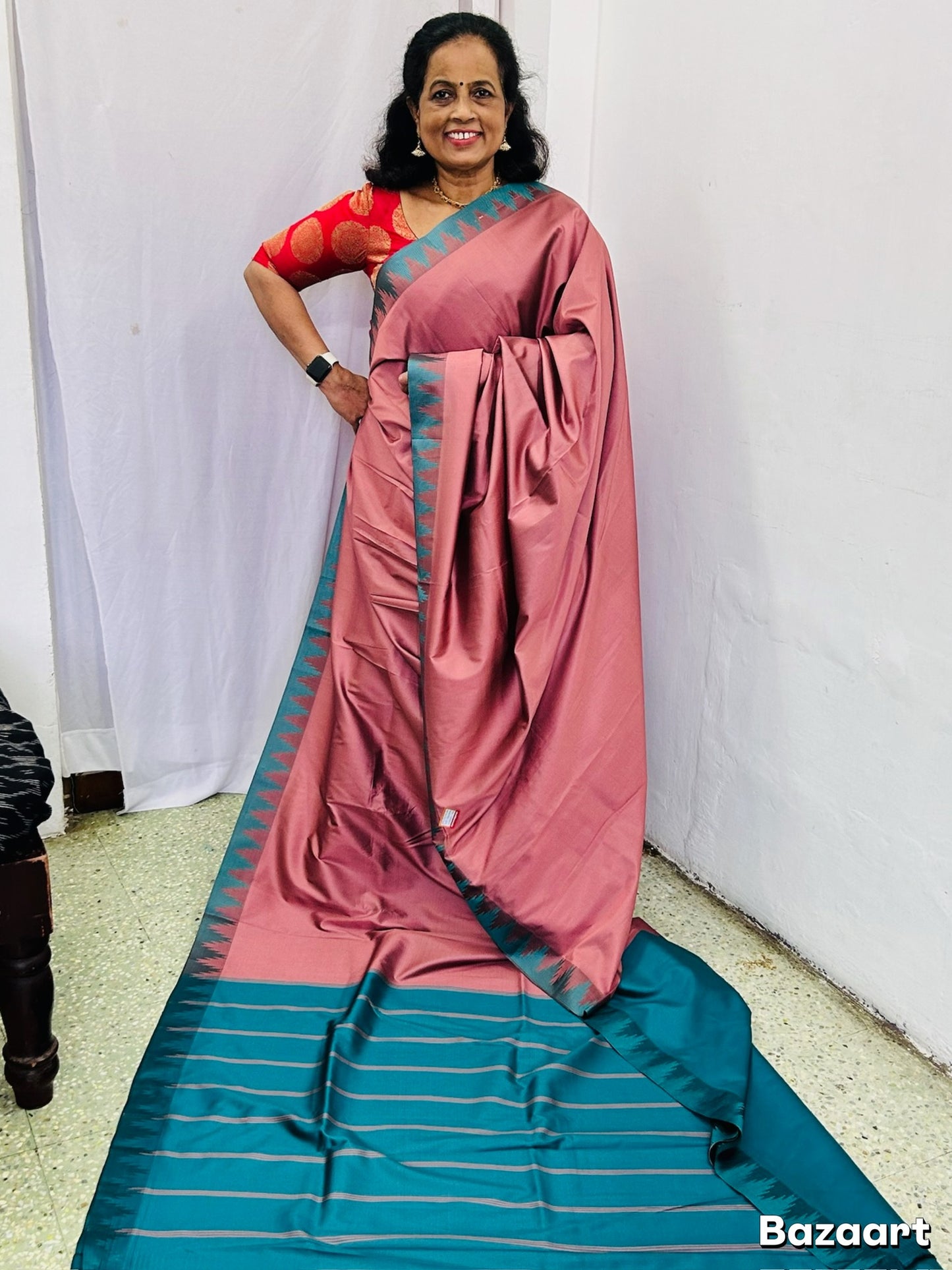 Ahana  Pink semi soft silk saree with Teal border and Teal blouse