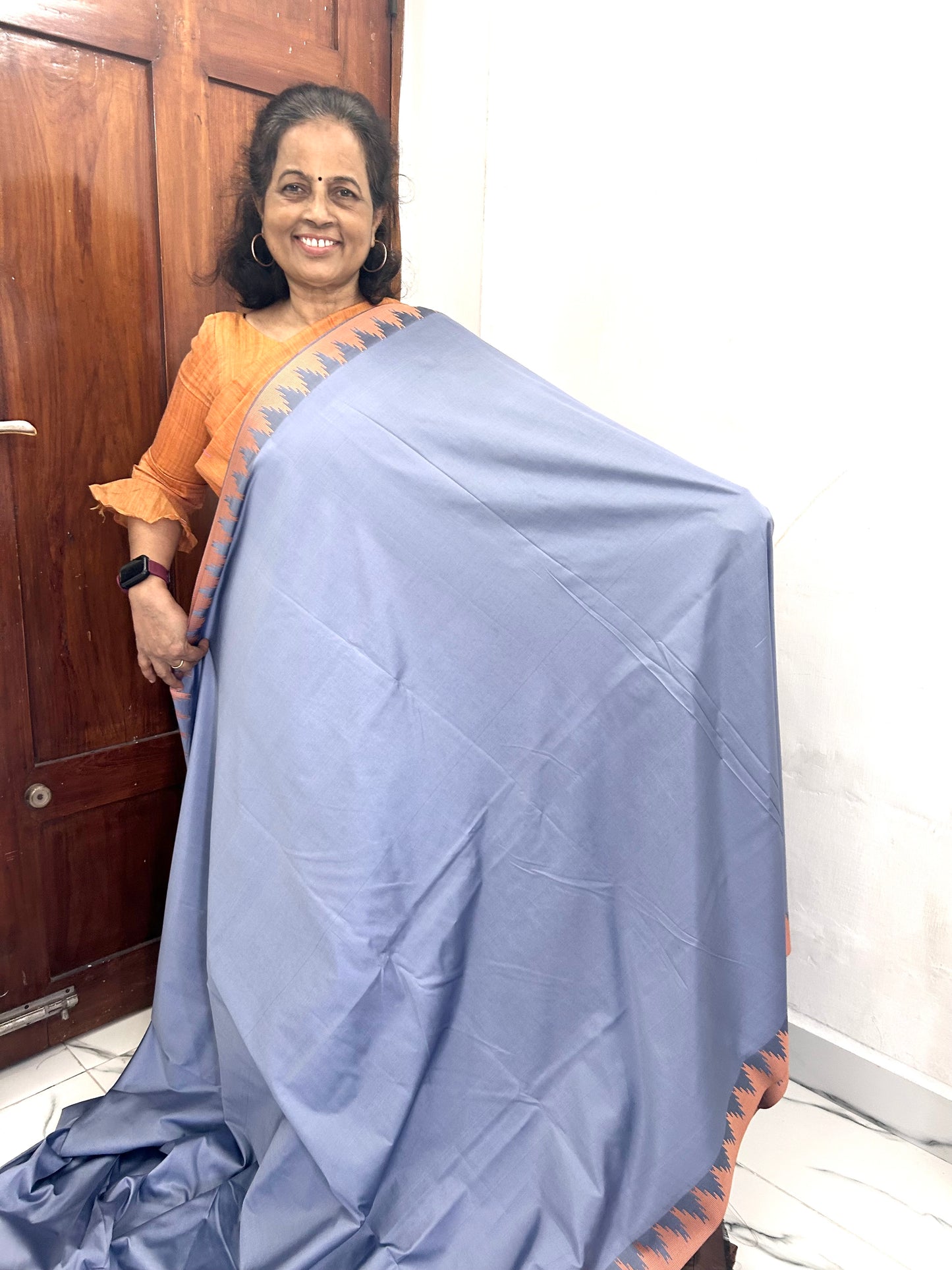 Ahana Sky blue Semi Soft Silk Saree with Copper  Border Blouse