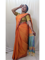 Ahaana Orange Soft Silk Saree with Light blue Blouse