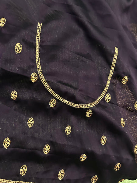 Advika Black designer saree and purple blouse
