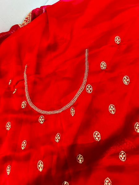 Red designer saree with red design blouse