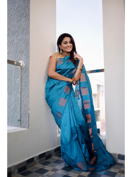 Ahaana Blue   soft silk Saree with gold prints border