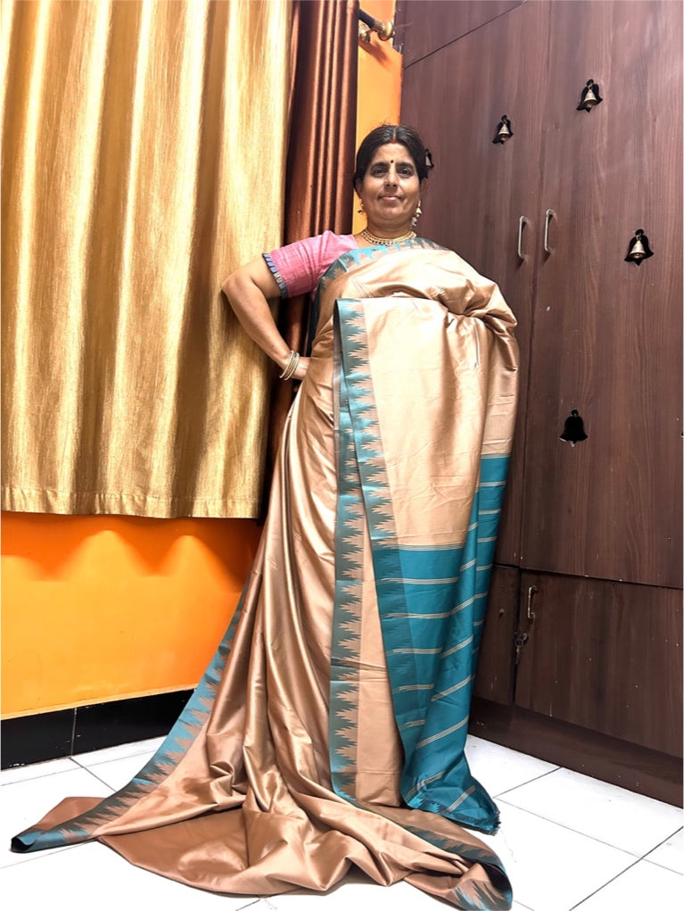 Ahaana beige soft silk saree with Teal border