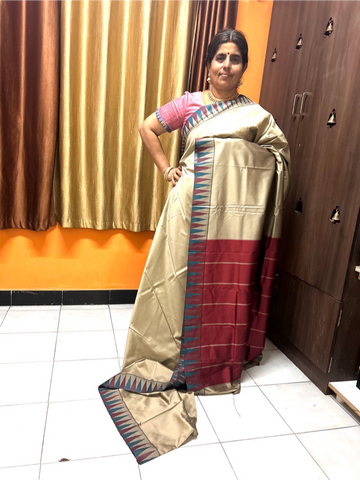 Ahaana beige soft silk saree with Maroon temple border