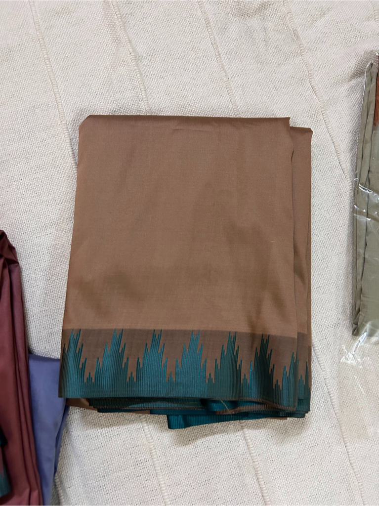 Ahaana beige soft silk saree with Teal border