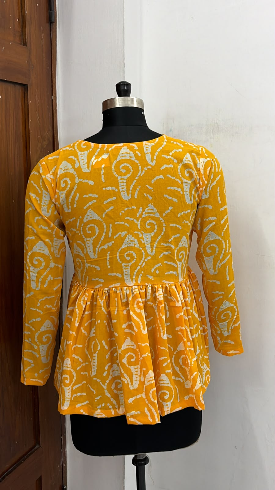 Florence Bloom Peplum Top