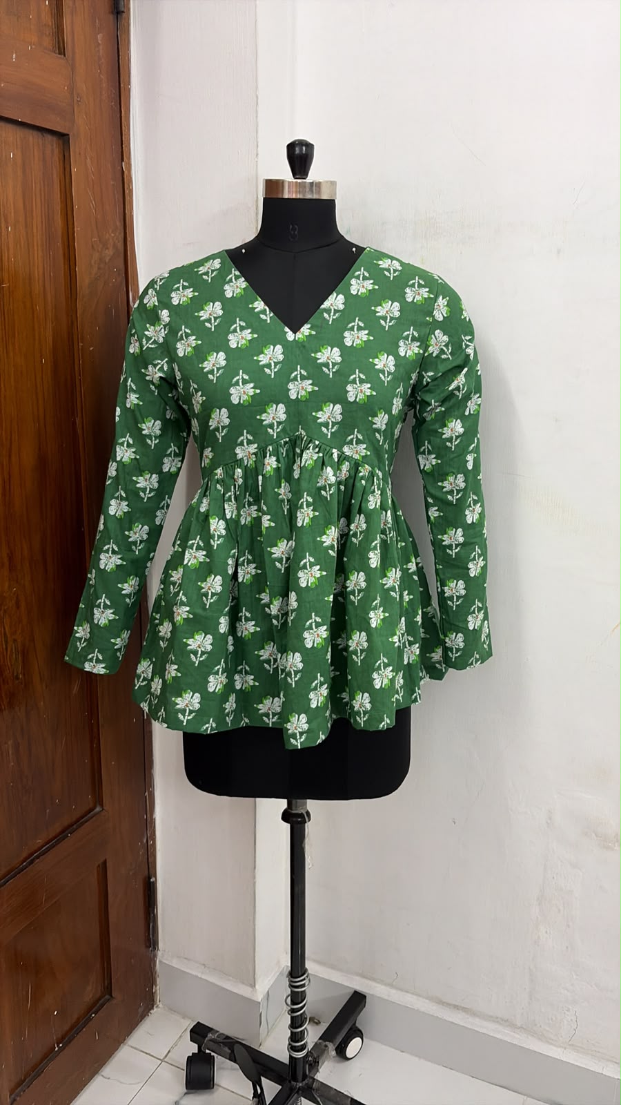 Florence Bloom Peplum Top