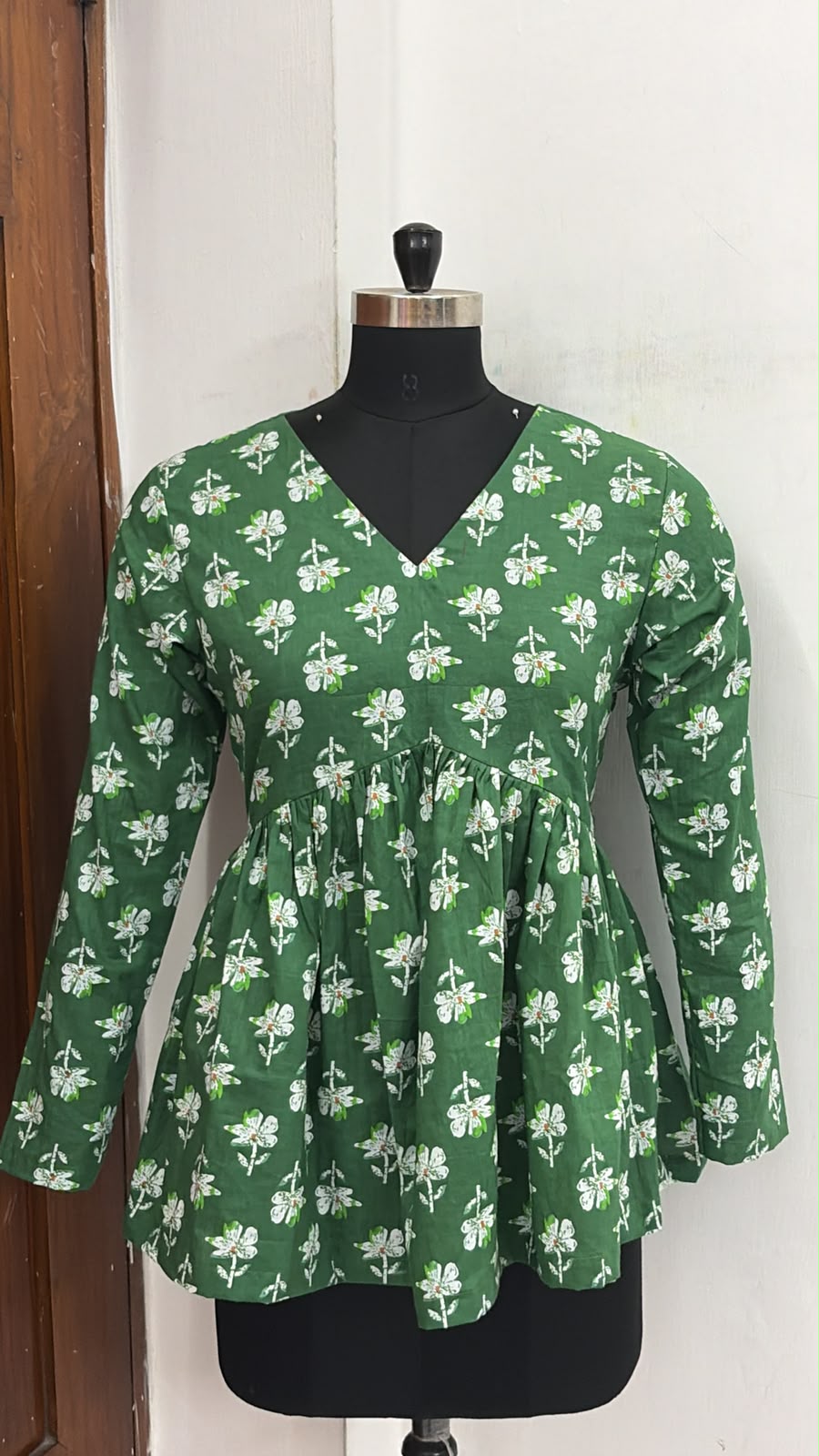 Florence Bloom Peplum Top