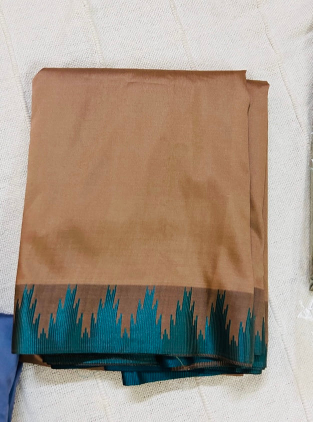 Ahana beige Semi soft silk saree with Teal border and Teal blouse