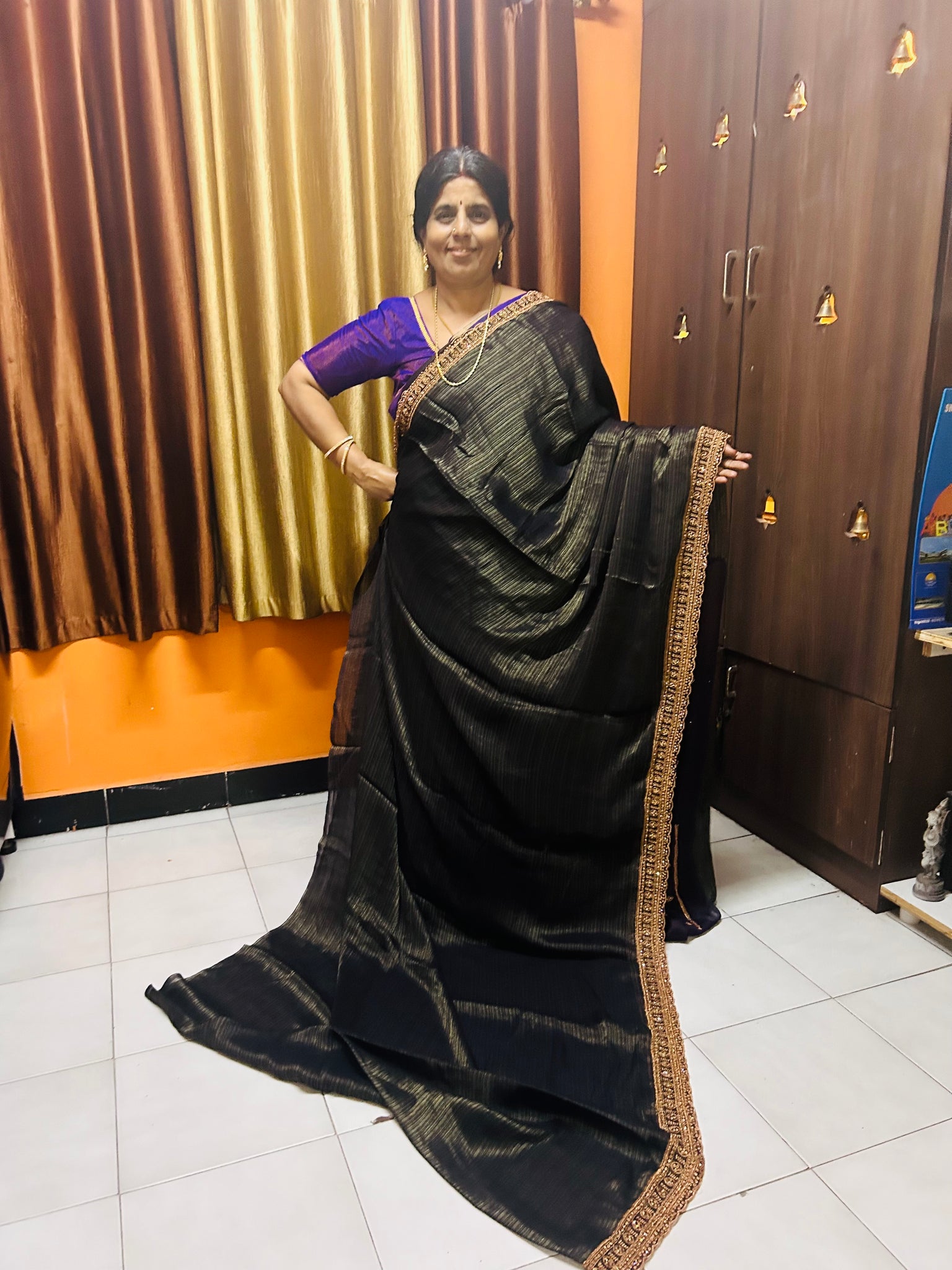 Advika Black designer saree and purple blouse