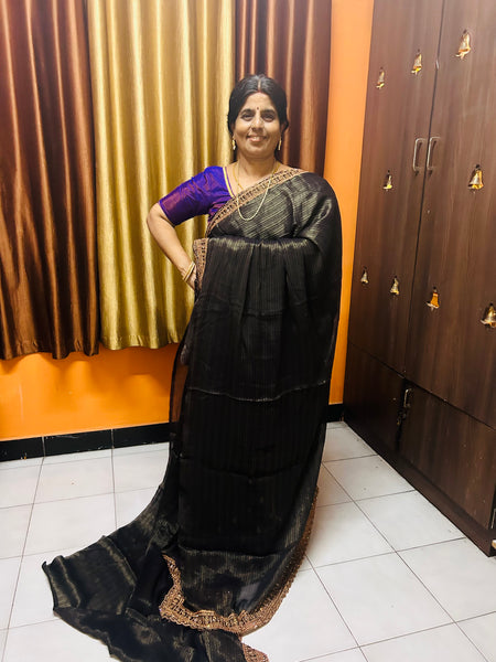 Advika Black designer saree and purple blouse