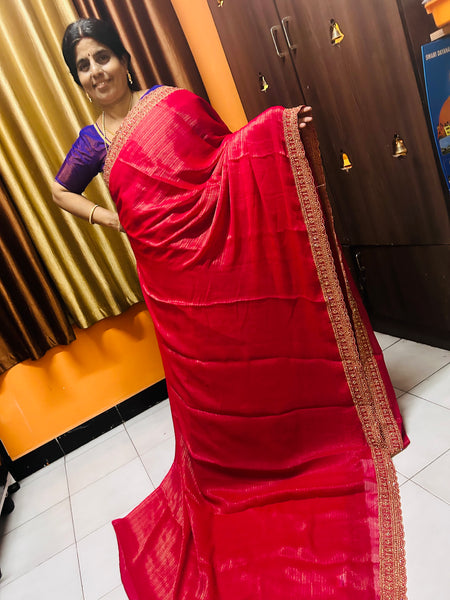 Red designer saree with red design blouse