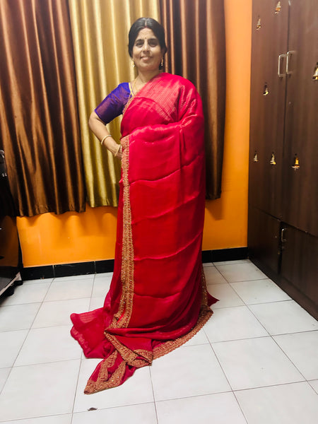 Red designer saree with red design blouse